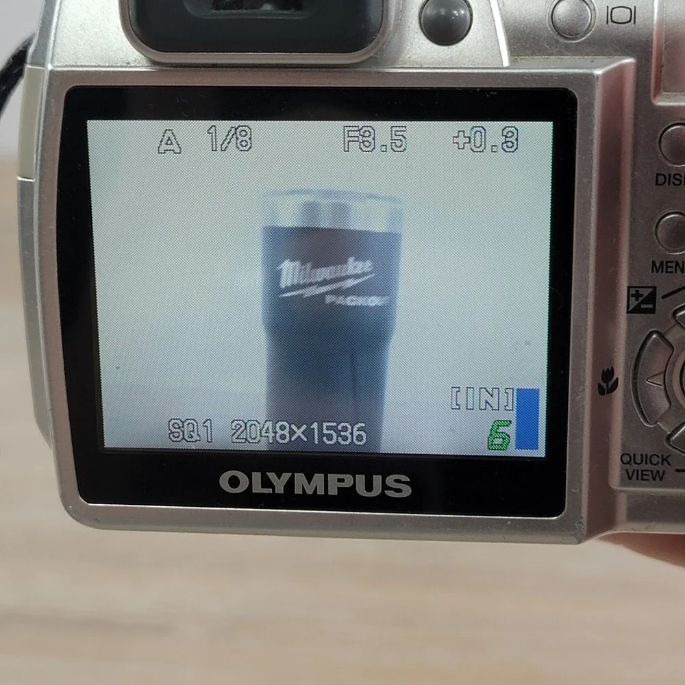 Olympus SP-510UZ 7.1 Megapixel Digital Camera 10x Optical Zoom Silver No Cap